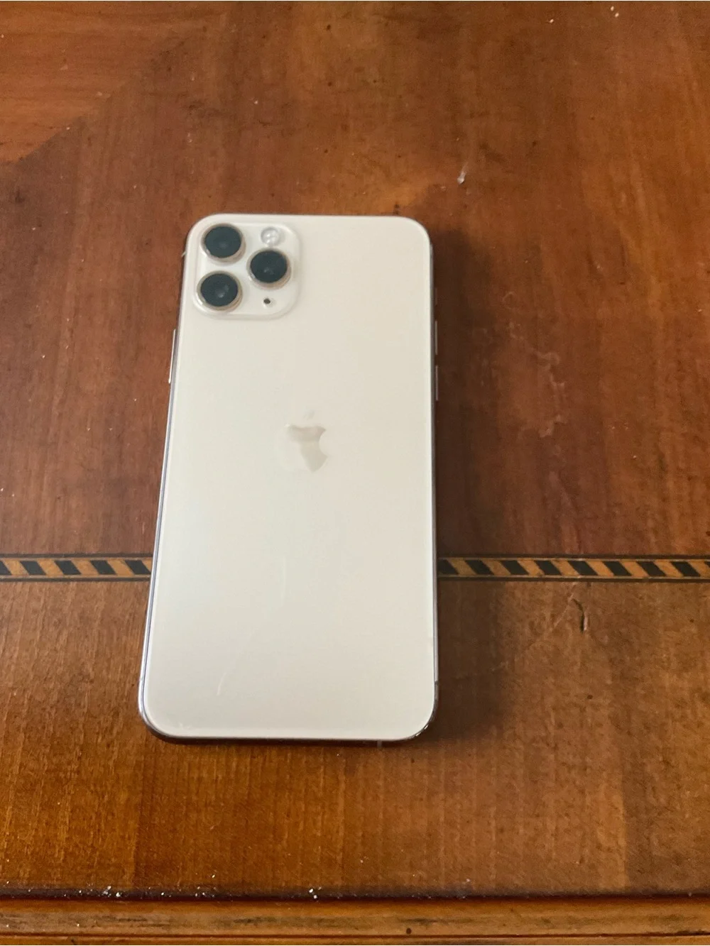 Apple iPhone 11 Pro - Silver/White Finish. Charging cord. In original box.